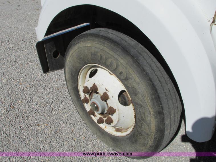 image for item J8726 1987 Volvo White WIM semi truck