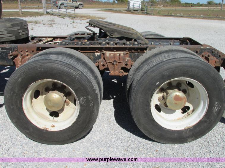 image for item J8726 1987 Volvo White WIM semi truck