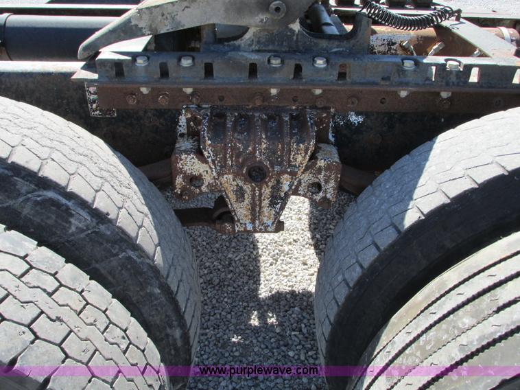 image for item J8726 1987 Volvo White WIM semi truck