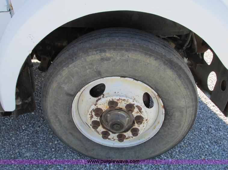 image for item J8726 1987 Volvo White WIM semi truck