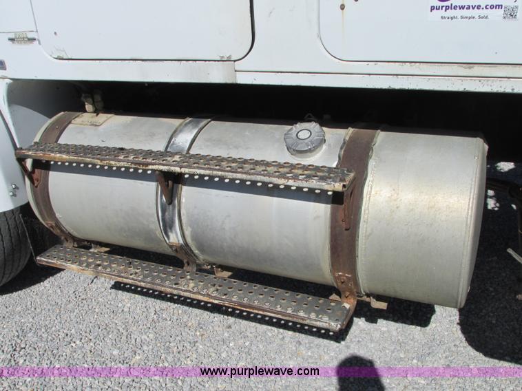 image for item J8726 1987 Volvo White WIM semi truck