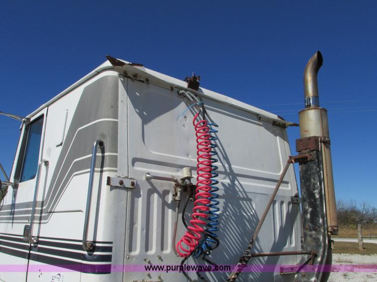 image for item J8726 1987 Volvo White WIM semi truck