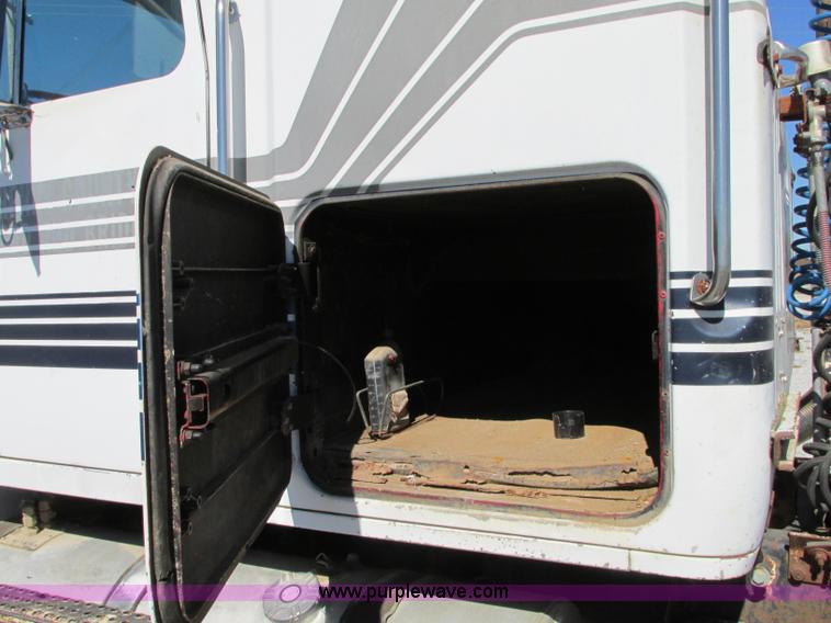 image for item J8726 1987 Volvo White WIM semi truck