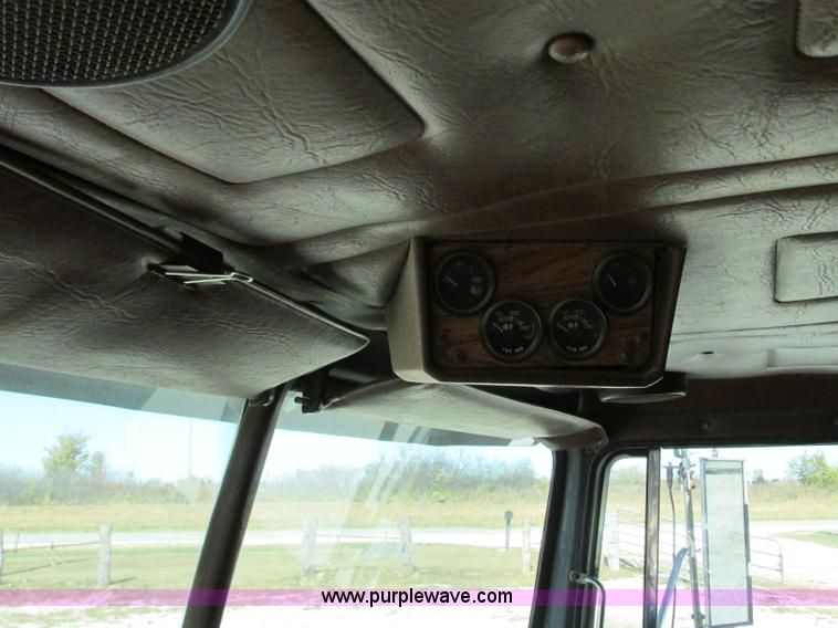 image for item J8726 1987 Volvo White WIM semi truck