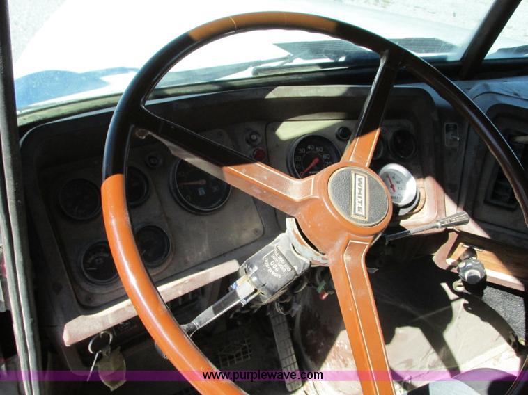 image for item J8726 1987 Volvo White WIM semi truck