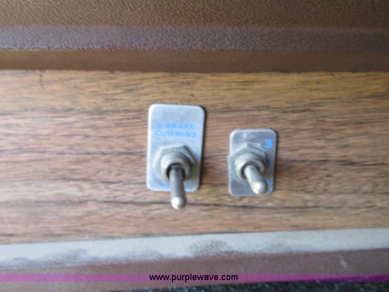 image for item J8726 1987 Volvo White WIM semi truck