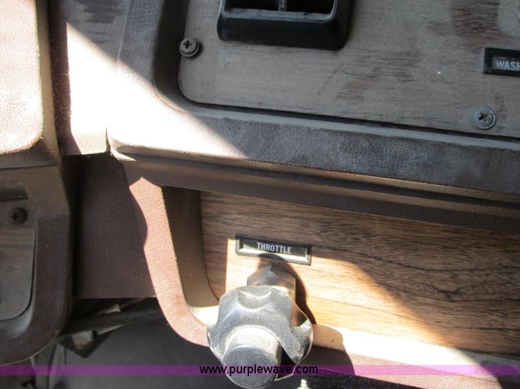 image for item J8726 1987 Volvo White WIM semi truck