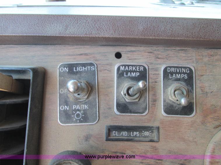 image for item J8726 1987 Volvo White WIM semi truck