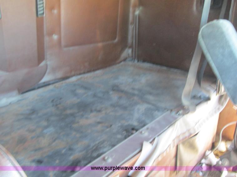 image for item J8726 1987 Volvo White WIM semi truck