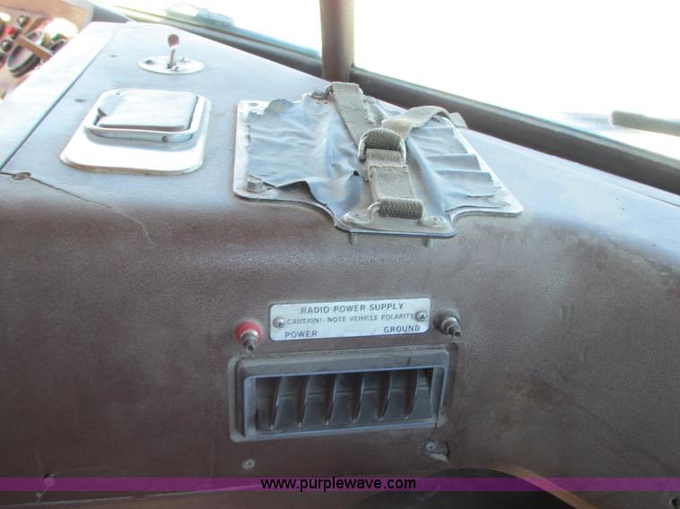 image for item J8726 1987 Volvo White WIM semi truck