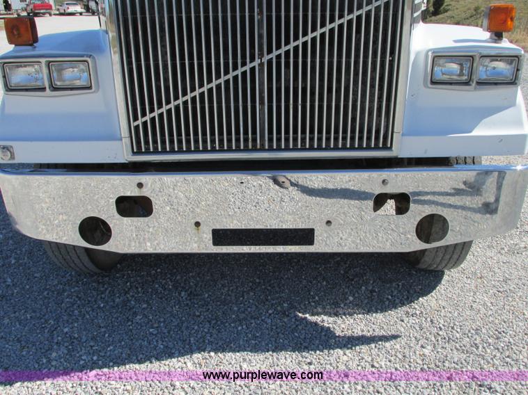 image for item J8726 1987 Volvo White WIM semi truck