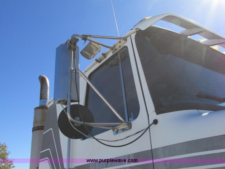 image for item J8726 1987 Volvo White WIM semi truck