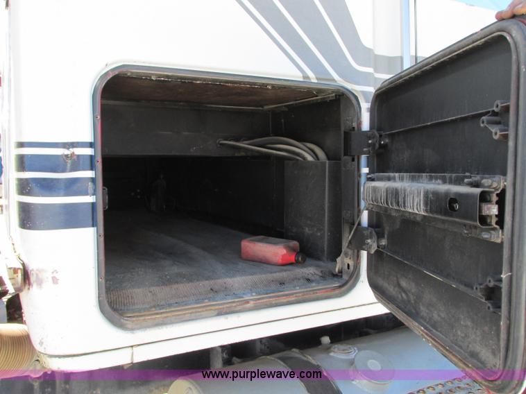 image for item J8726 1987 Volvo White WIM semi truck