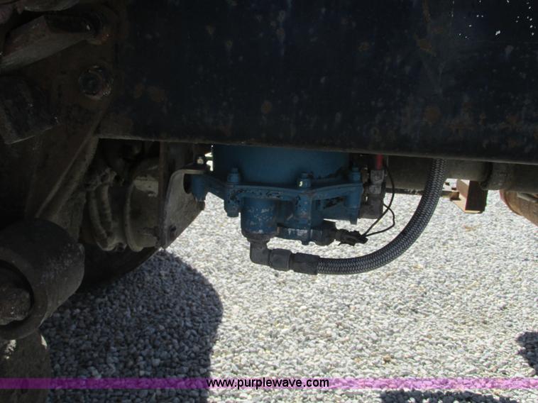 image for item J8726 1987 Volvo White WIM semi truck