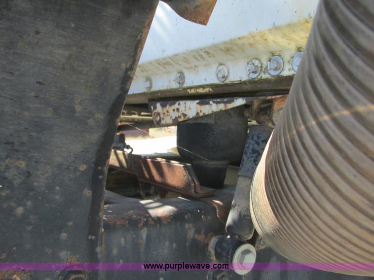 image for item J8726 1987 Volvo White WIM semi truck