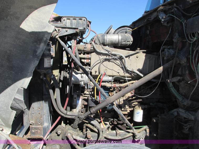 image for item J8726 1987 Volvo White WIM semi truck