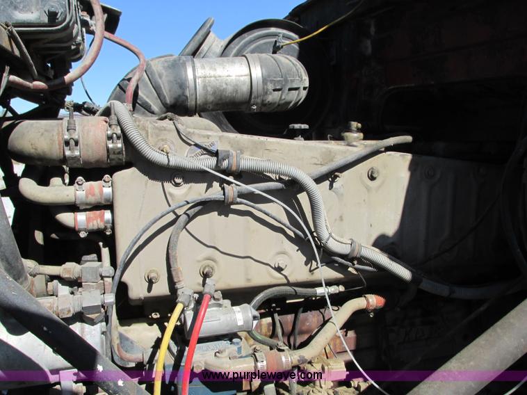 image for item J8726 1987 Volvo White WIM semi truck