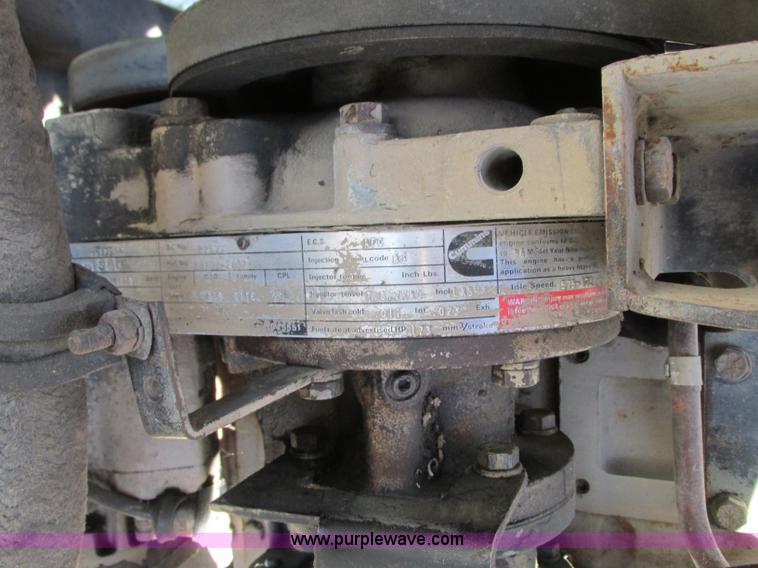 image for item J8726 1987 Volvo White WIM semi truck