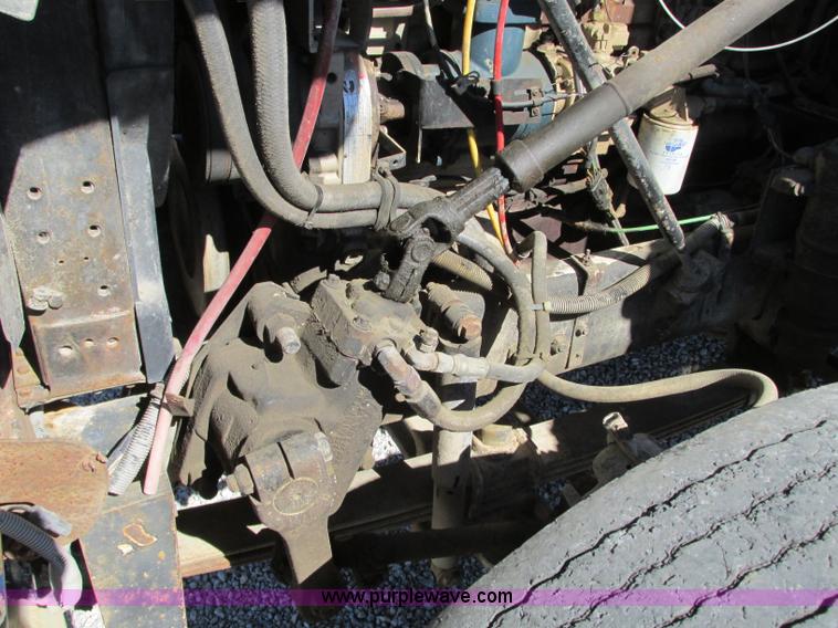 image for item J8726 1987 Volvo White WIM semi truck