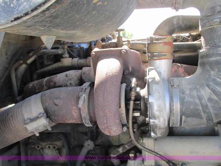 image for item J8726 1987 Volvo White WIM semi truck