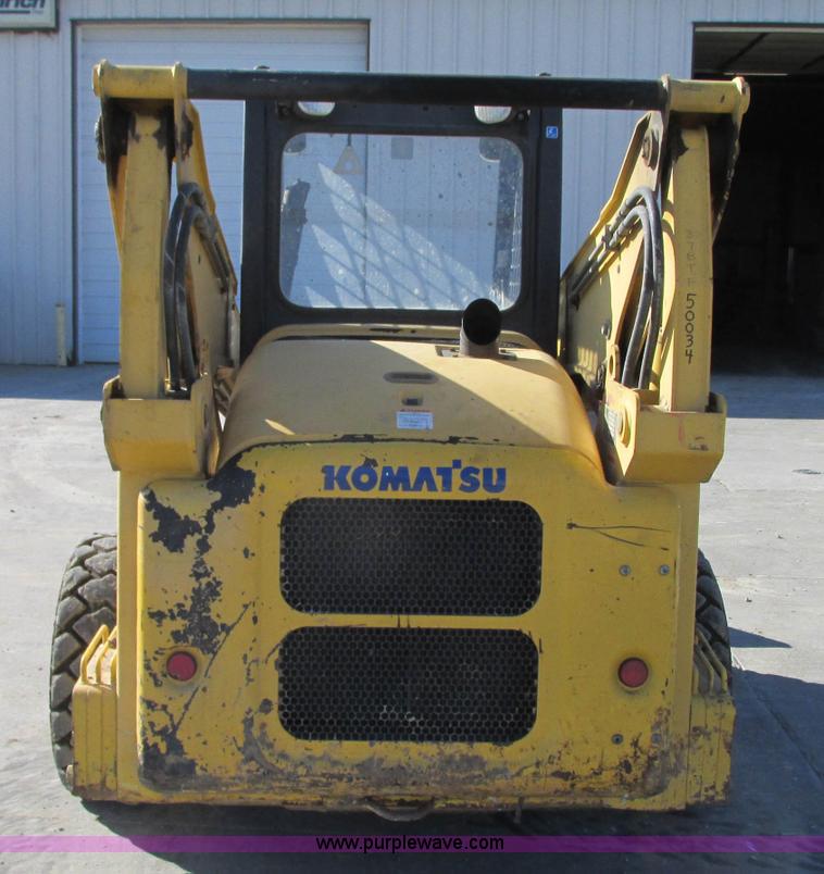 image for item J8737 2004 Komatsu SK820 skid steer