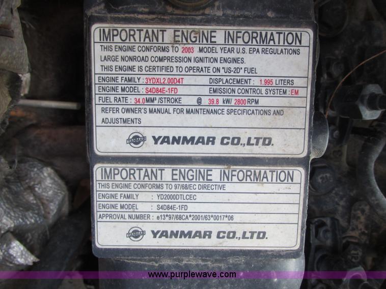 image for item J8737 2004 Komatsu SK820 skid steer