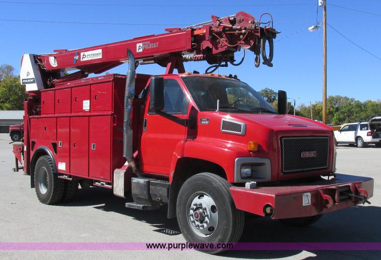 image for item K2212 2005 GMC C8500 digger derrick truck