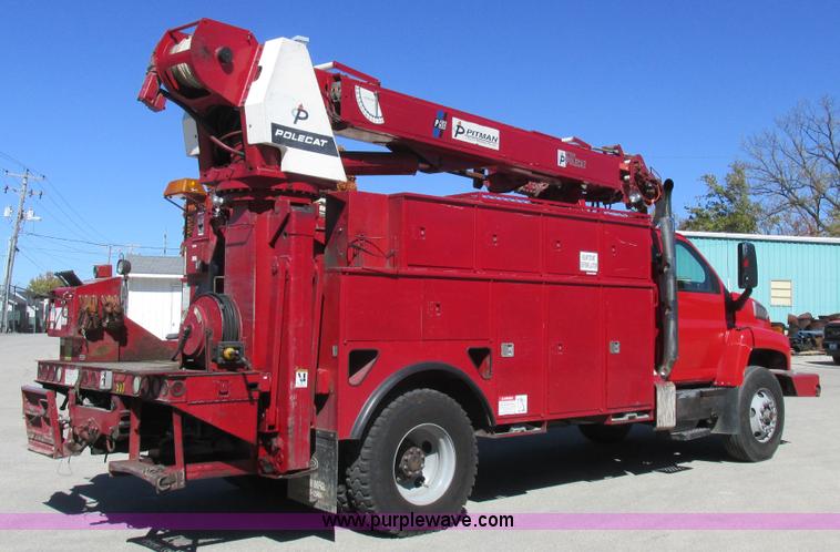 image for item K2212 2005 GMC C8500 digger derrick truck