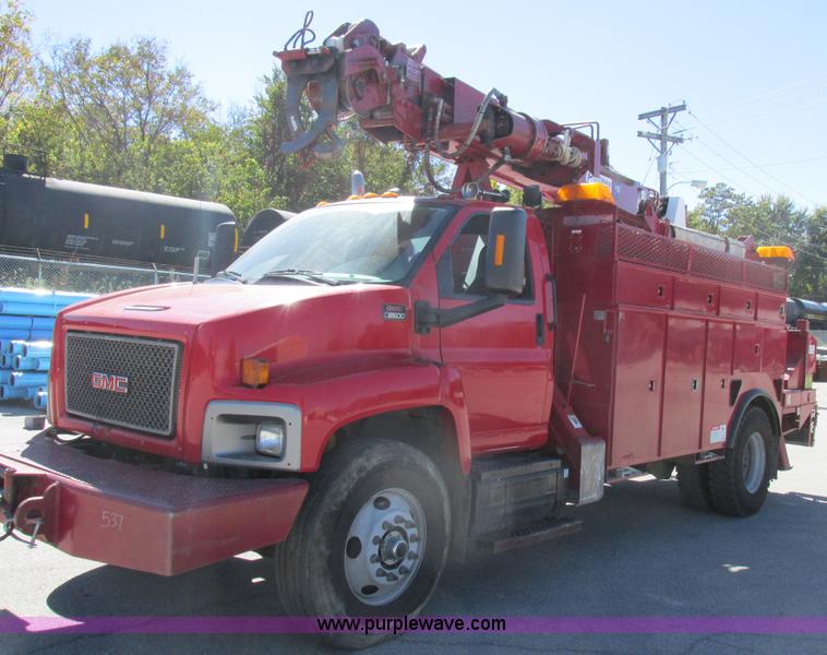 image for item K2212 2005 GMC C8500 digger derrick truck