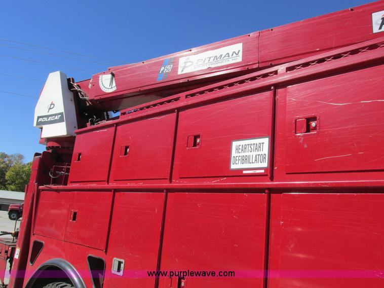 image for item K2212 2005 GMC C8500 digger derrick truck