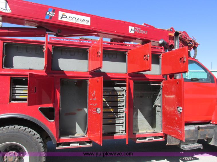 image for item K2212 2005 GMC C8500 digger derrick truck