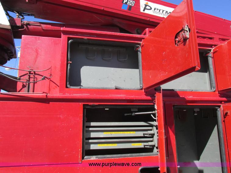 image for item K2212 2005 GMC C8500 digger derrick truck