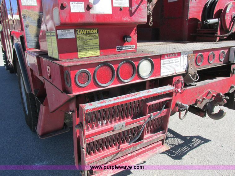 image for item K2212 2005 GMC C8500 digger derrick truck