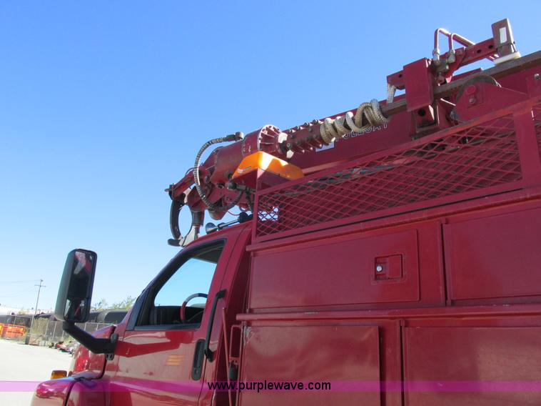image for item K2212 2005 GMC C8500 digger derrick truck