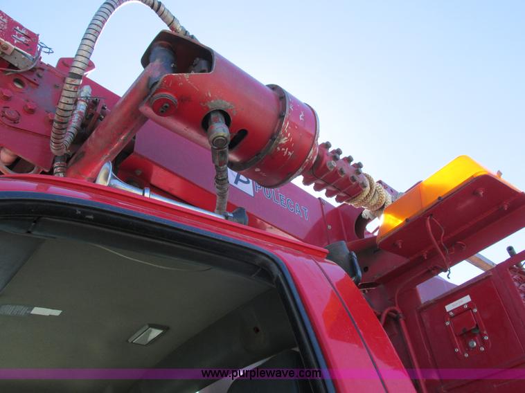 image for item K2212 2005 GMC C8500 digger derrick truck