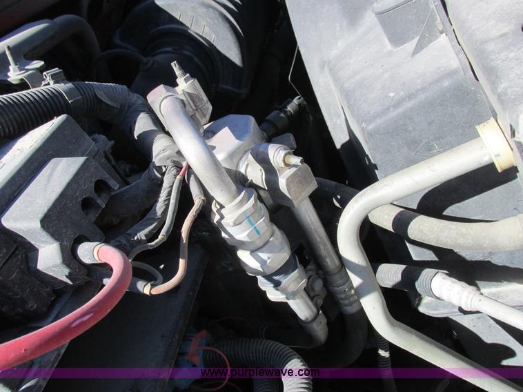 image for item K2212 2005 GMC C8500 digger derrick truck