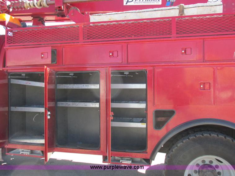 image for item K2212 2005 GMC C8500 digger derrick truck