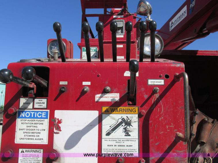 image for item K2212 2005 GMC C8500 digger derrick truck