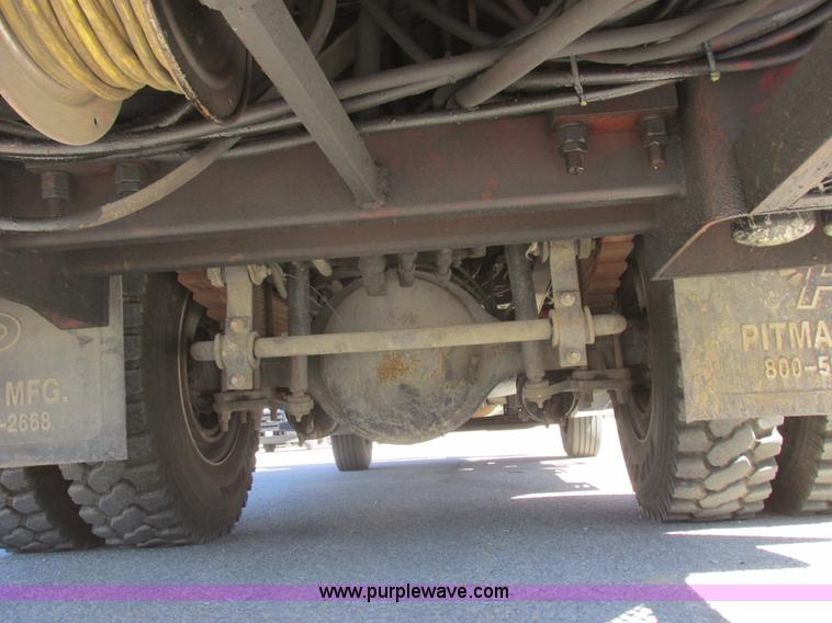 image for item K2212 2005 GMC C8500 digger derrick truck