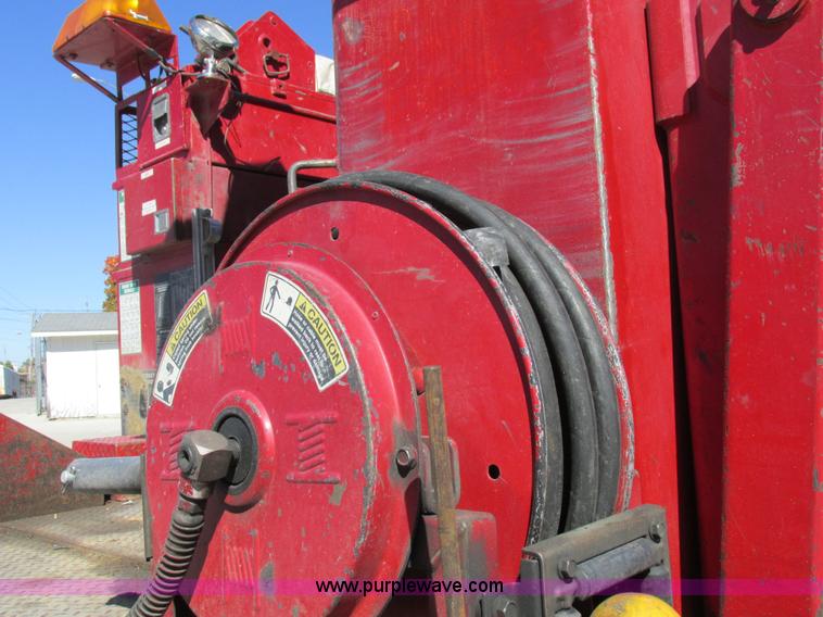 image for item K2212 2005 GMC C8500 digger derrick truck