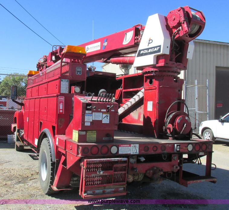 image for item K2213 2005 GMC C8500 digger derrick truck