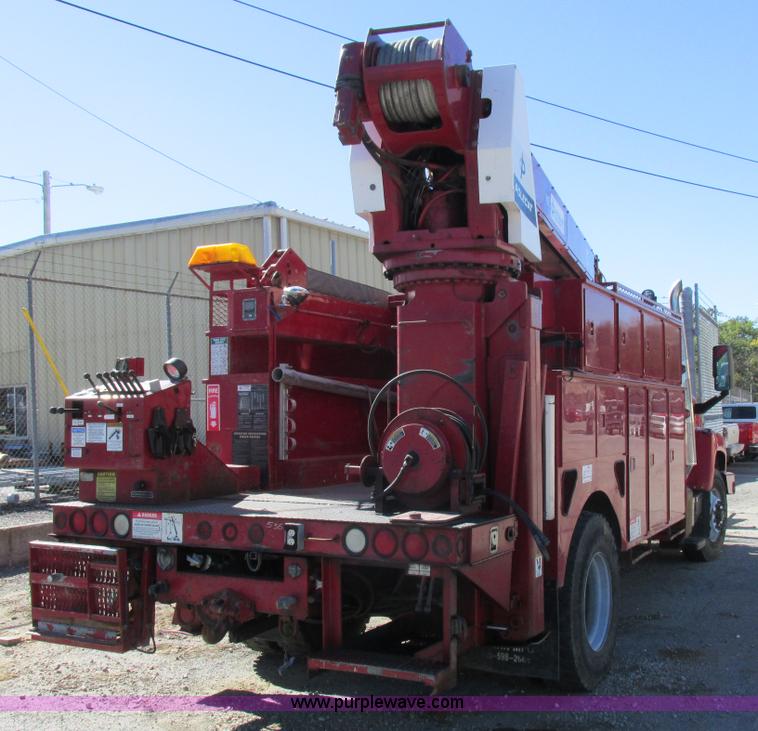 image for item K2213 2005 GMC C8500 digger derrick truck