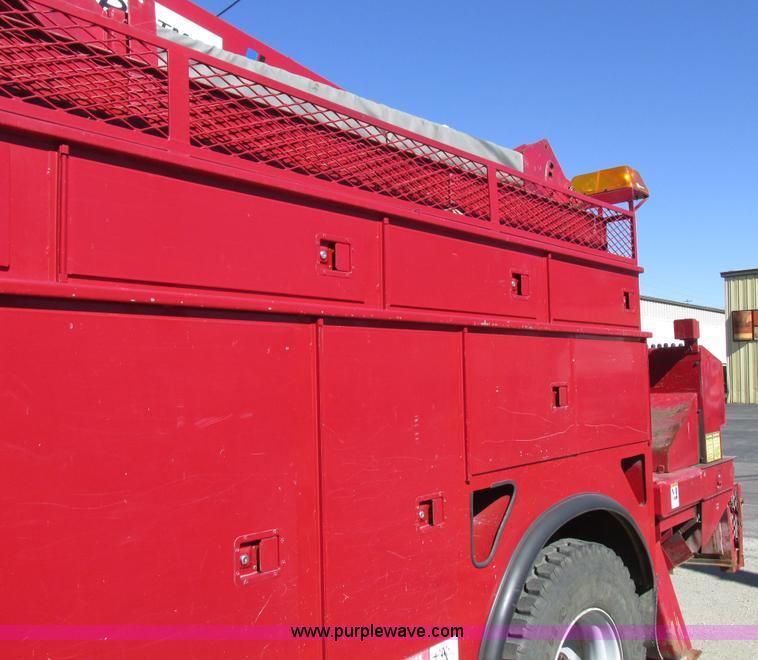 image for item K2213 2005 GMC C8500 digger derrick truck