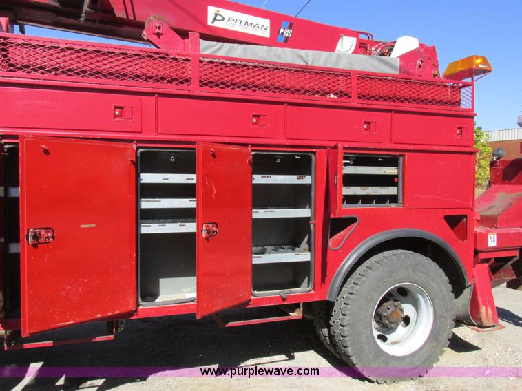 image for item K2213 2005 GMC C8500 digger derrick truck