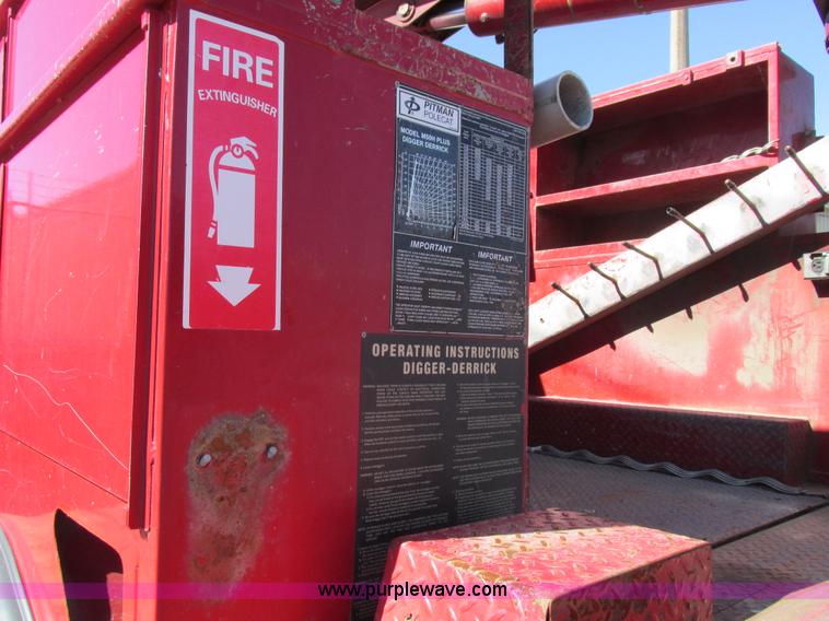 image for item K2213 2005 GMC C8500 digger derrick truck