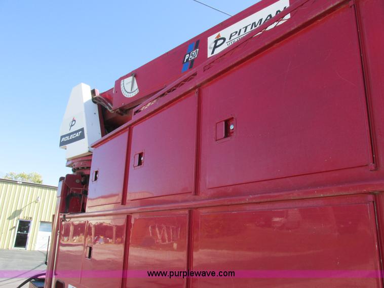 image for item K2213 2005 GMC C8500 digger derrick truck