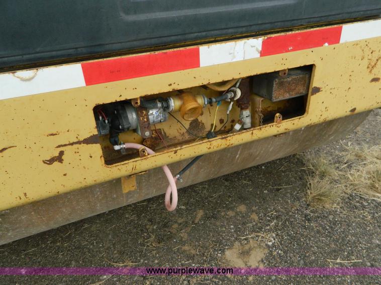 image for item K8234 1998 Caterpillar CB634C double drum roller