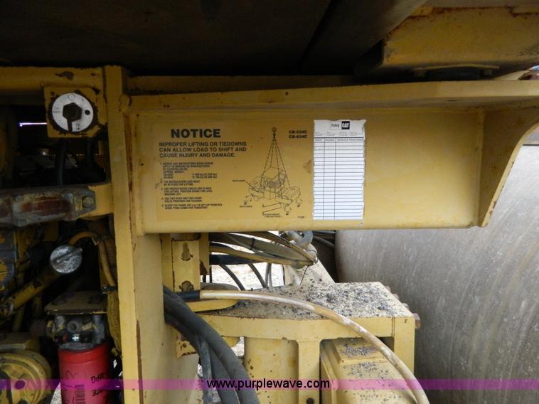 image for item K8234 1998 Caterpillar CB634C double drum roller