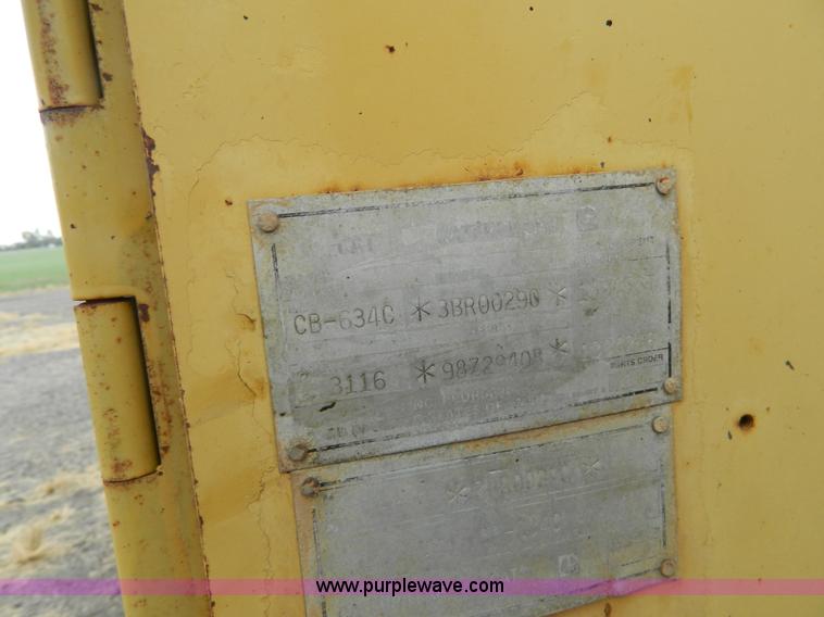 image for item K8234 1998 Caterpillar CB634C double drum roller