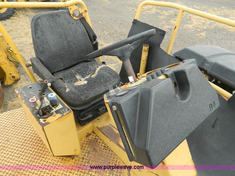 image for item K8234 1998 Caterpillar CB634C double drum roller